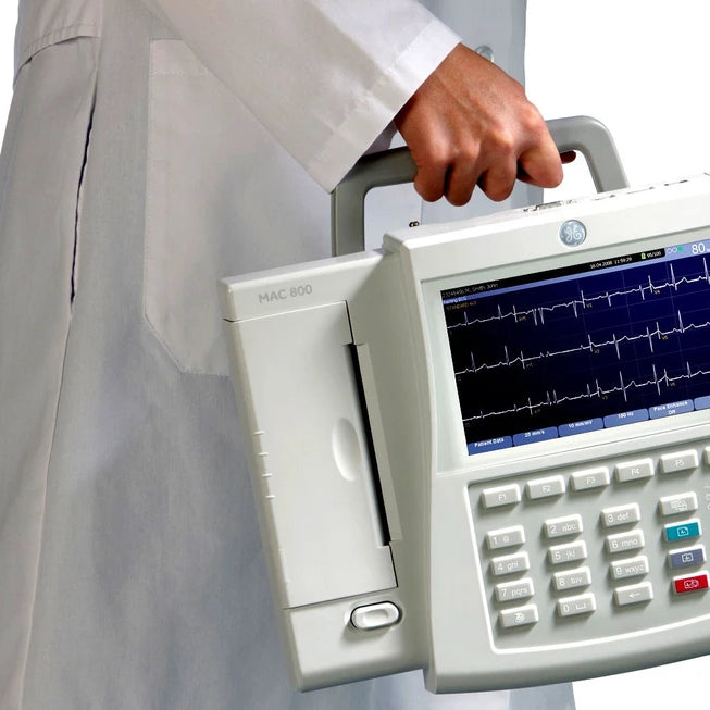 EKG machine in dental clinic monitoring patient heart activity