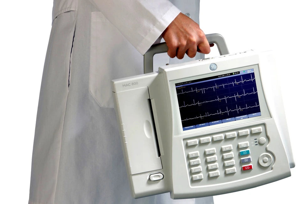 EKG machine in dental clinic monitoring patient heart activity